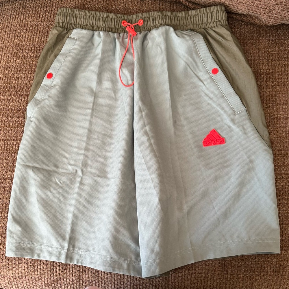 Brand new pair of adidas athletic shorts.  Lightweight, quick drying, brand new